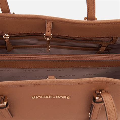 michael michael kors jet set travel md ew tote|michael kors travel tote large.